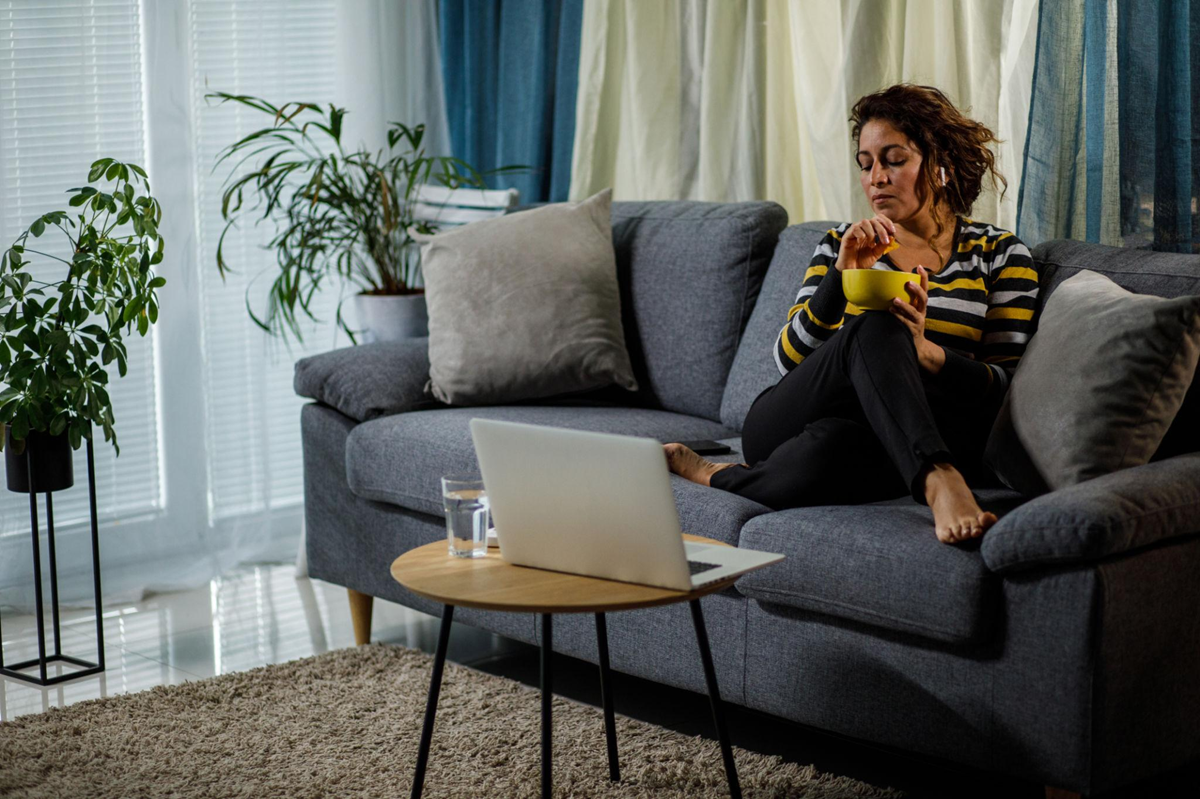 Woman feeling sressed on couch